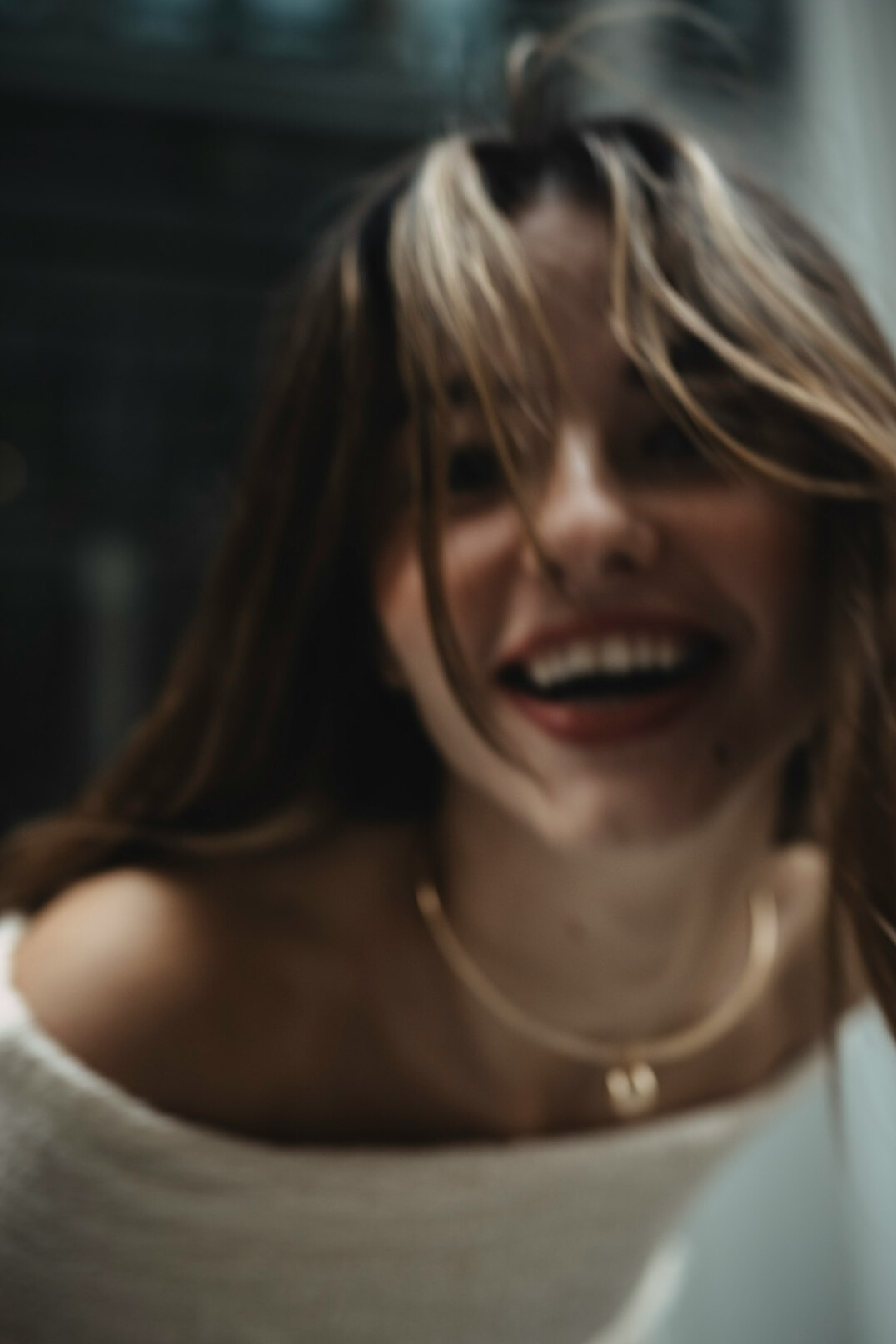 Portrait of a smiling woman with light hair